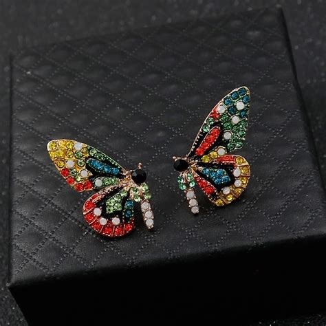 Boucle d'oreille Papillon .